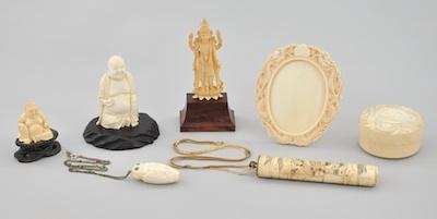 Appraisal: A Group of Ivory Carvings Containing a carved seated Buddha