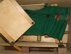 Appraisal: A quantity of bookbinding equipment in large boxes qty