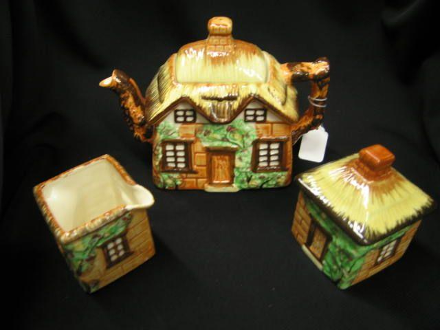 Appraisal: Occupied Japan Figural Pottery Cottage Tea Set teapot creamer sugar