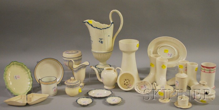 Appraisal: Twenty-five Pieces of Assorted Wedgwood Creamware including four sock warmers