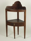 Appraisal: WASH STAND - Circa mahogany corner wash stand with shaped