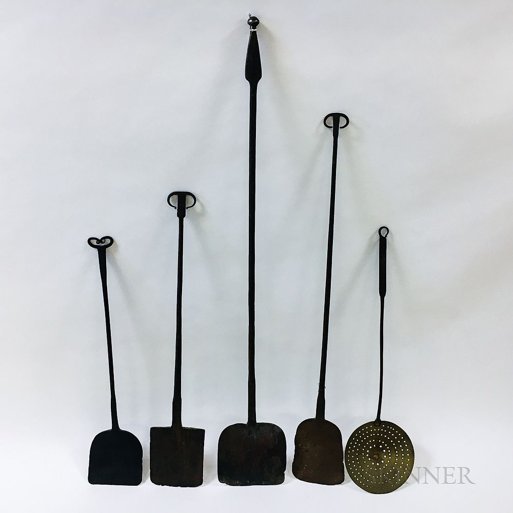 Appraisal: Four Wrought Iron Peels and a Skimmer Four Wrought Iron