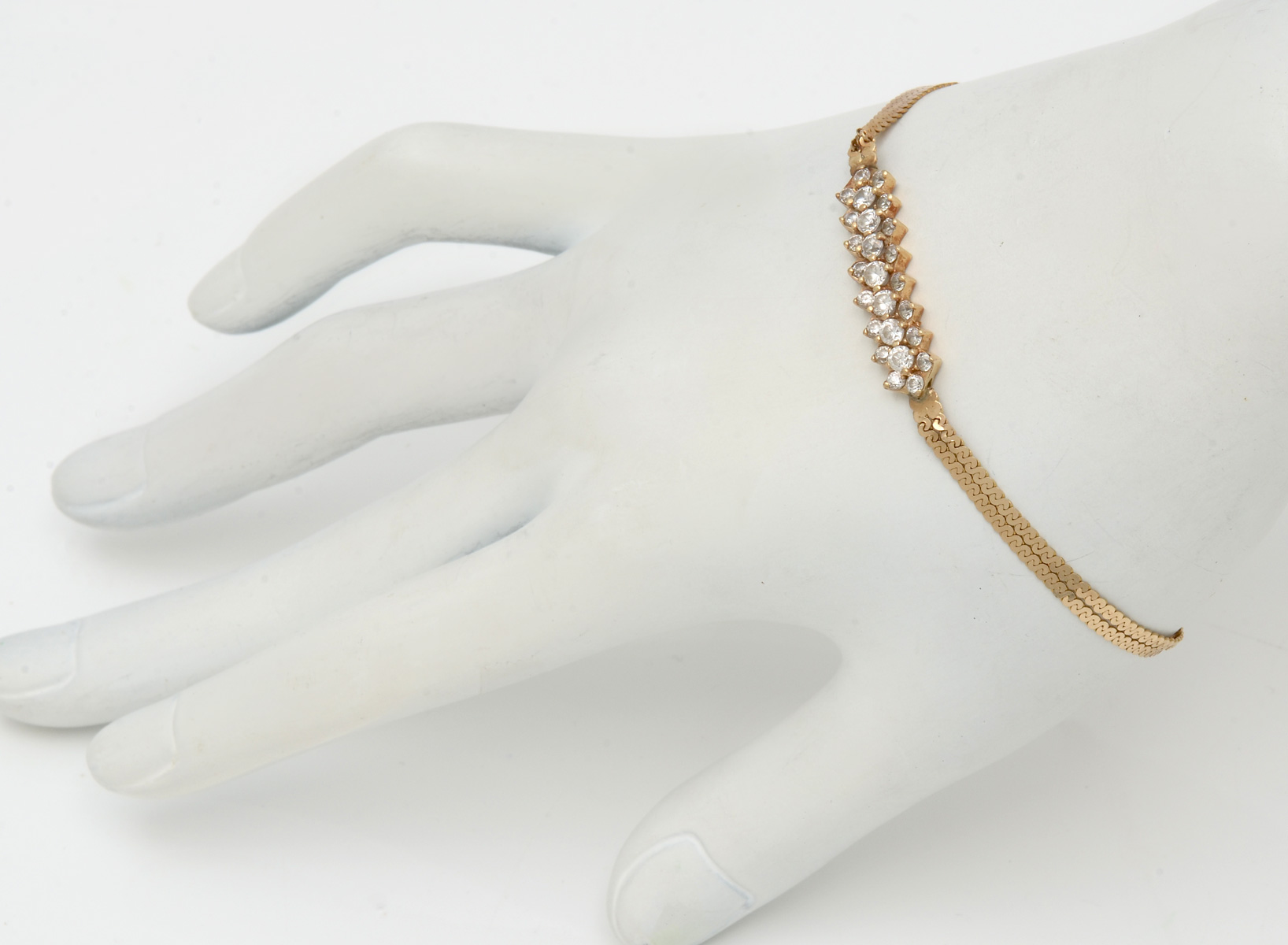 Appraisal: K CTW WHITE STONE BRACELET K yellow gold bracelet contains