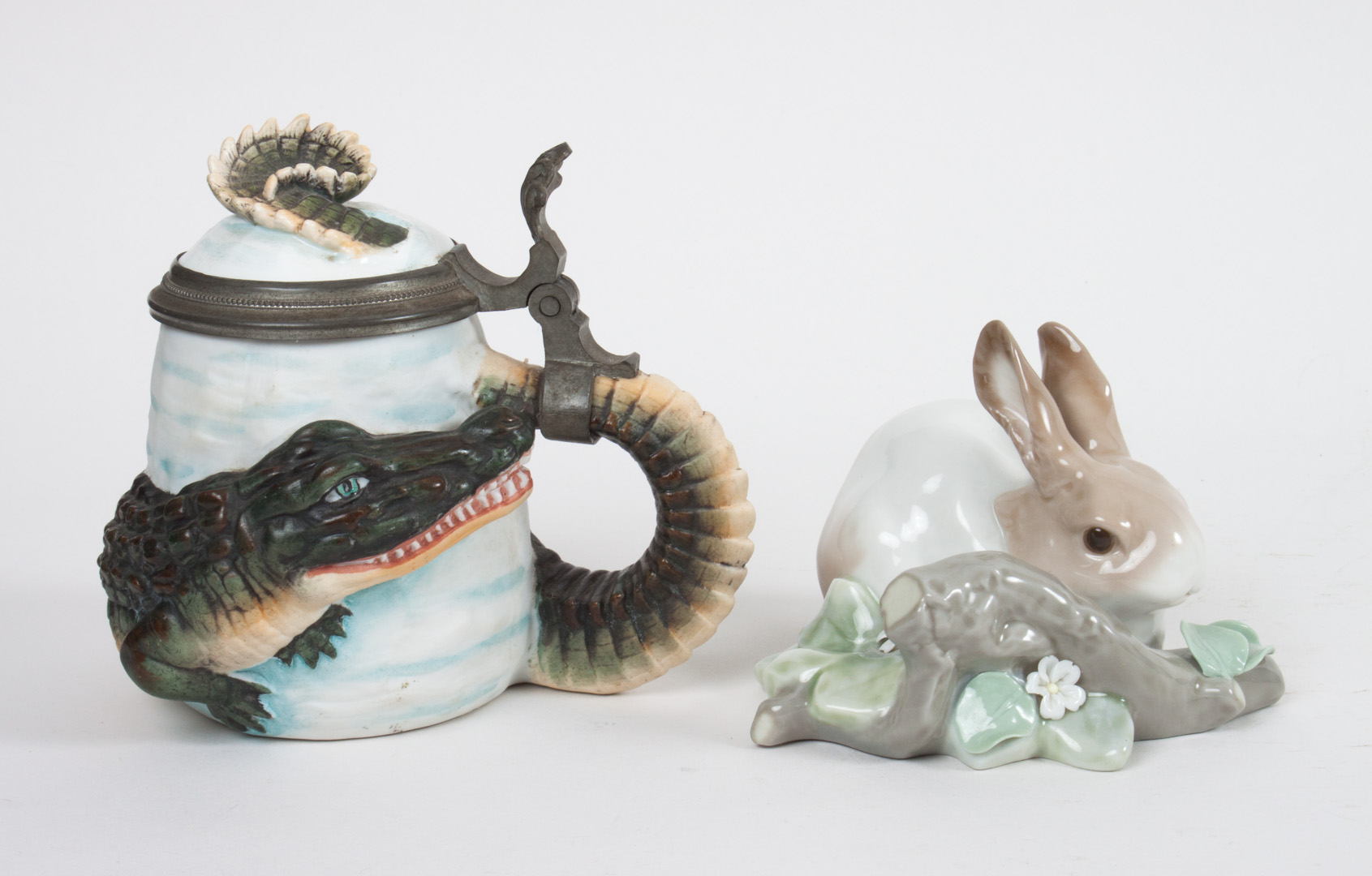 Appraisal: E Bohne Sohne bisque stein and a Lladro rabbit first