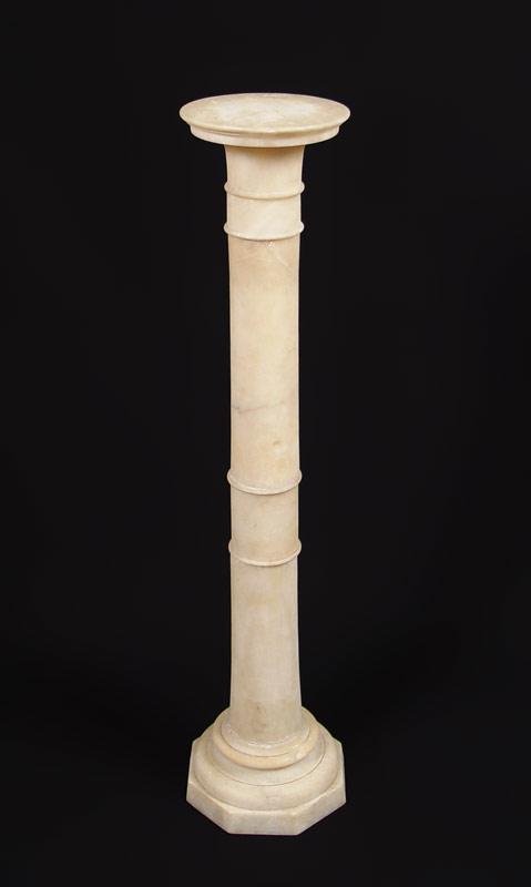 Appraisal: WHITE MARBLE PEDESTAL Slender pedestal with rotating top Round top