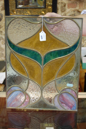 Appraisal: An Art Nouveau coloured glass and lead panel x cm