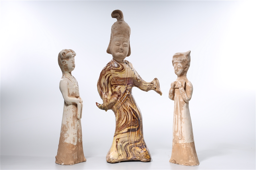 Appraisal: Group of three Chinese tang-style pottery figures x x tallest