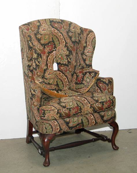 Appraisal: A Queen Anne style mahogany wing chair mid th century