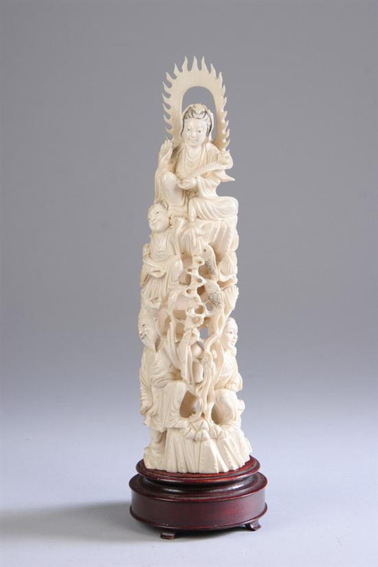 Appraisal: CHINESE IVORY FIGURAL GROUP th century Depicting Guanyin and attendants