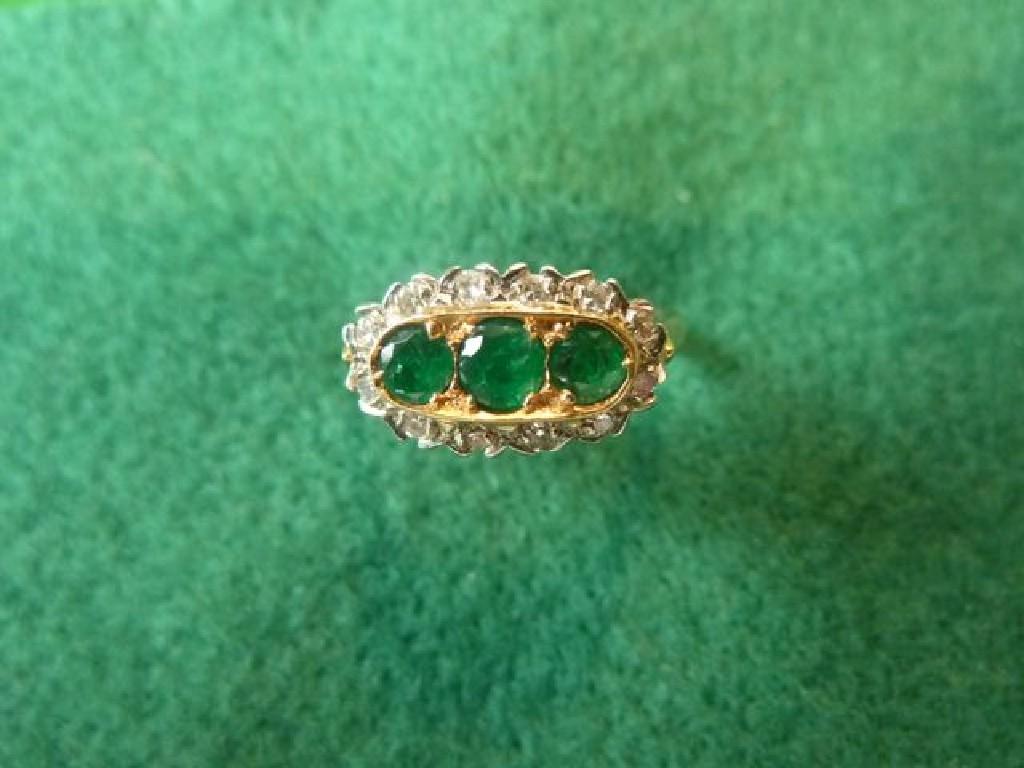 Appraisal: An ct gold diamond and emerald engagement ring