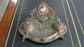 Appraisal: A French th century cast bronze desk stand