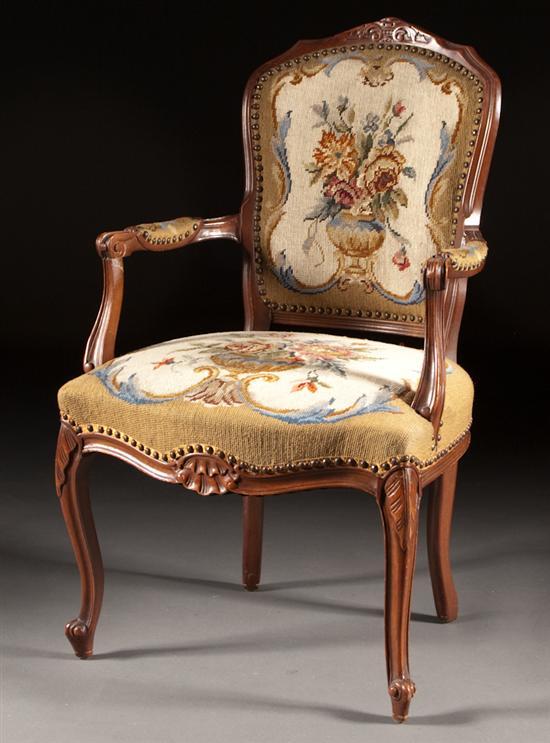 Appraisal: Louis XV style carved mahogany needlepoint upholstered fauteuil th century