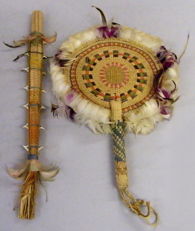 Appraisal: South Sea Islands Ceremonial woven coloured straw stick and circular