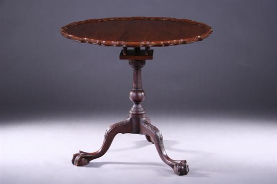 Appraisal: GEORGIAN STYLE CARVED MAHOGANY TRIPOD TABLE th century with later