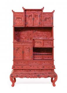 Appraisal: A CHINESE CINNABAR LACQUER DISPLAY CABINET A CHINESE CINNABAR LACQUER