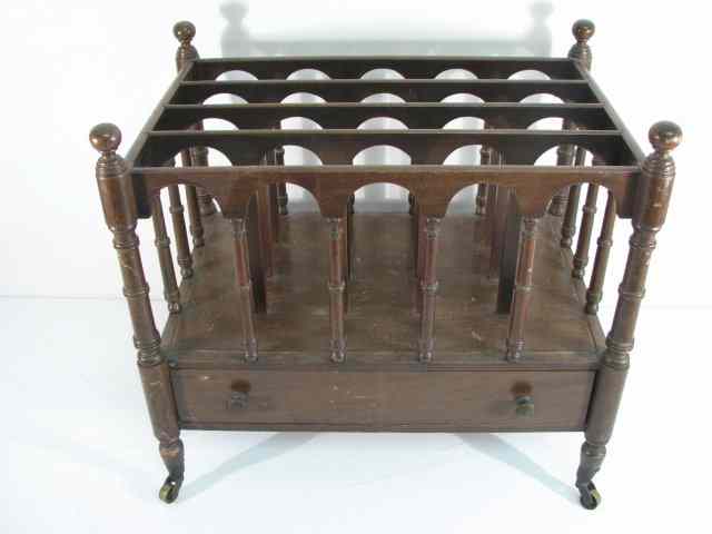 Appraisal: Mahogany finished Canterbury magazine rack Four sections with one drawer