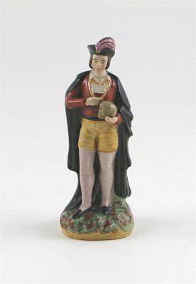 Appraisal: An unusual Staffordshire figure of Hamlet standing holding the skull