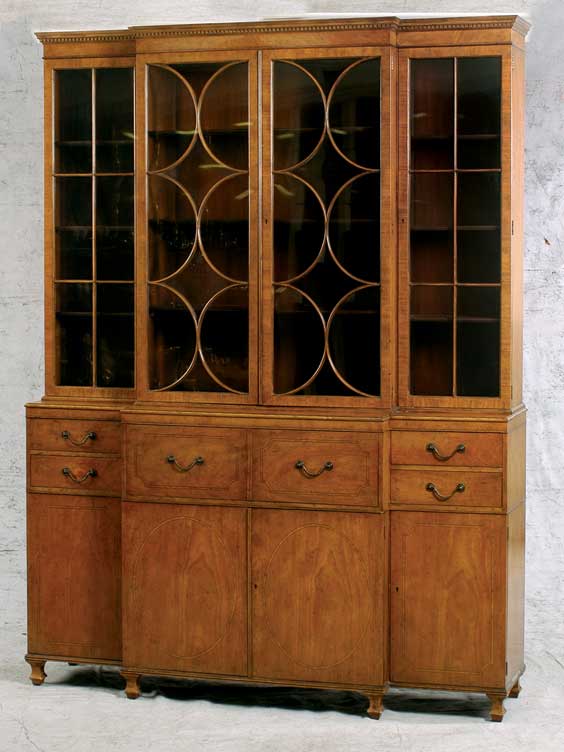 Appraisal: ANTIQUE-STYLE BREAKFRONT BY BAKER Antique-style English breakfront cabinet by Baker