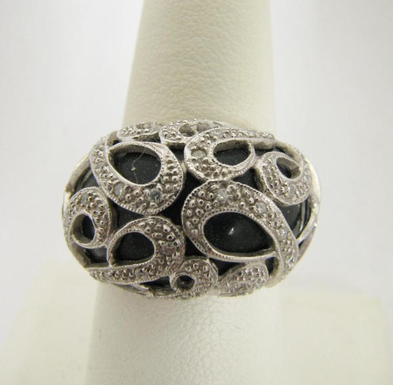 Appraisal: Lady's k White Gold Fashion Ring in unique swirl design