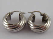 Appraisal: A pair of French hallmarked ct white gold hoop earrings