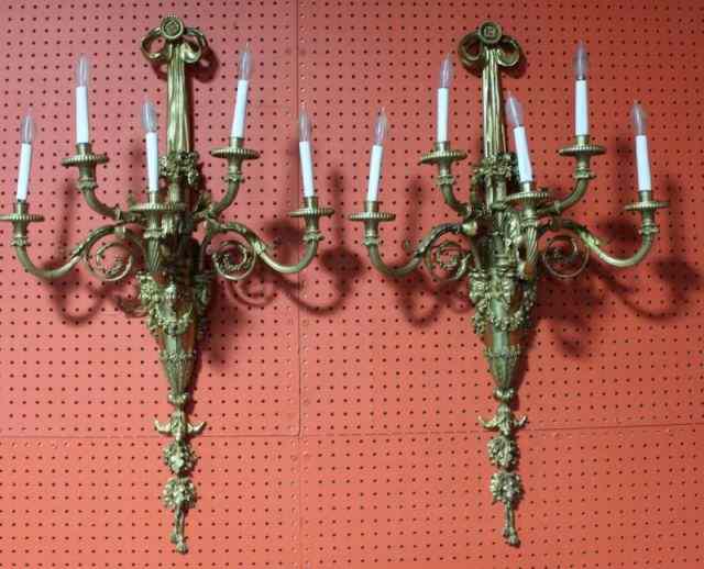 Appraisal: Pair of Large Bronze Sconces With Heads Tassels From a