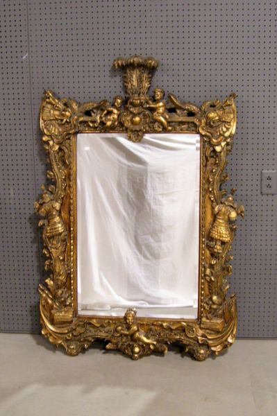 Appraisal: Empire Style Wall Mirror Highly decorated gilt wall mirror with