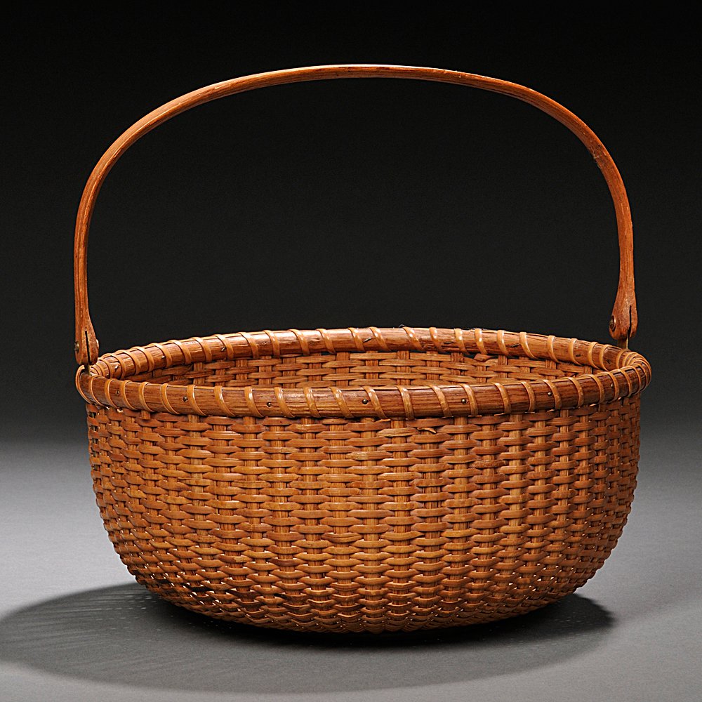 Appraisal: Round Swing-handled Nantucket Basket late th century the round form