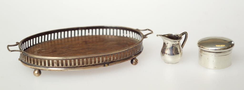 Appraisal: EDWARDIAN SILVER-MOUNTED MINIATURE TRAY BIRMINGHAM of oval form with pierced