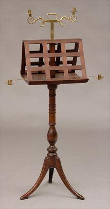 Appraisal: REGENCY BRASS-MOUNTED MAHOGANY DOUBLE READING STAND The rotating addoresed openwork