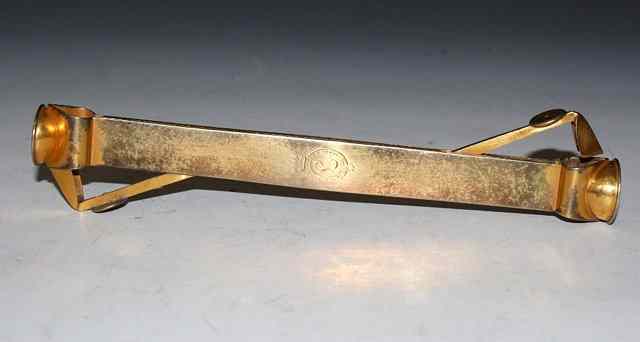 Appraisal: A DOUBLE ENDED SILVER GILT CIGAR CUTTER long London