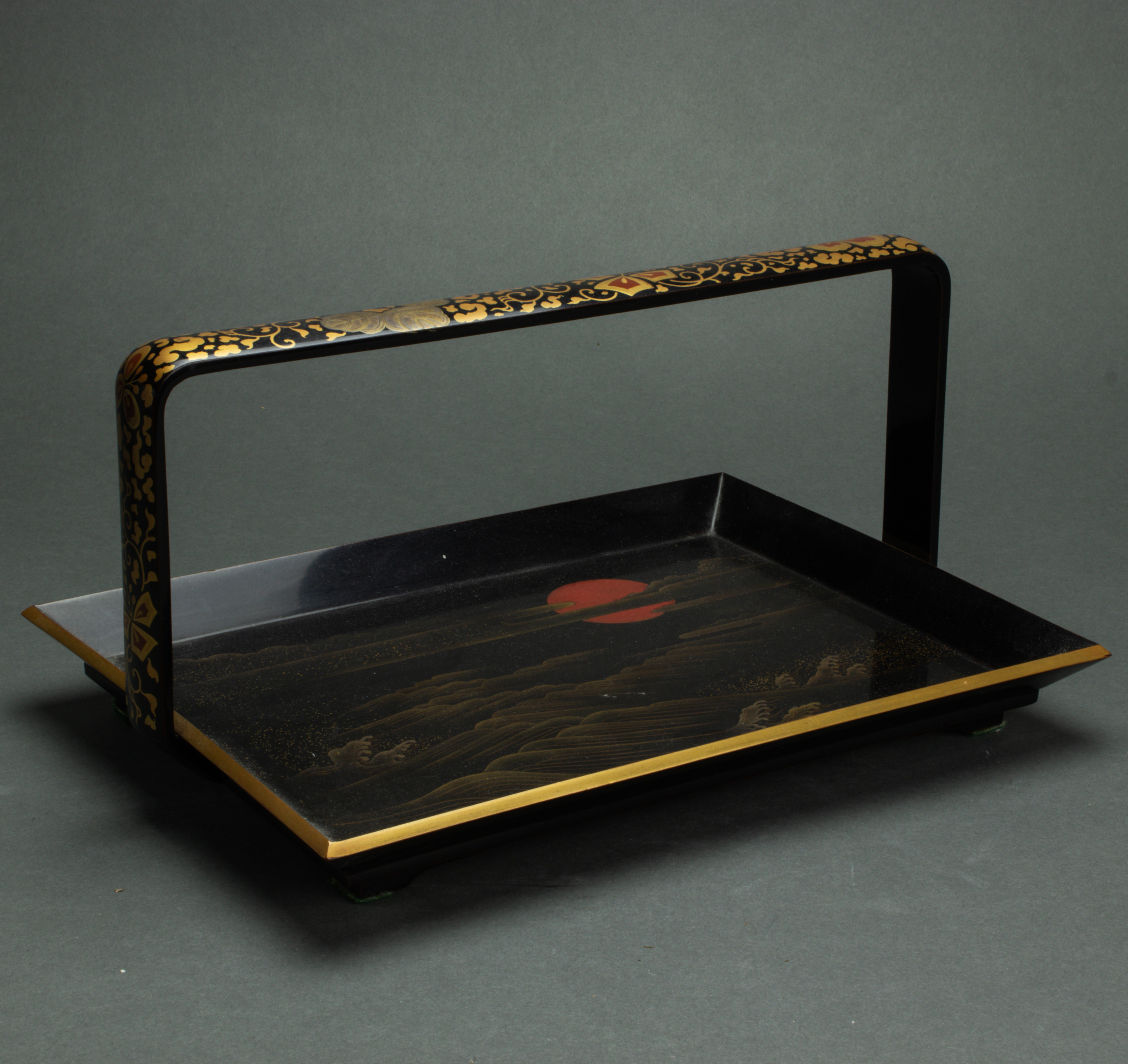 Appraisal: JAPANESE BLACK AND GILT LACQUERED HANDLED TRAY Japanese black and