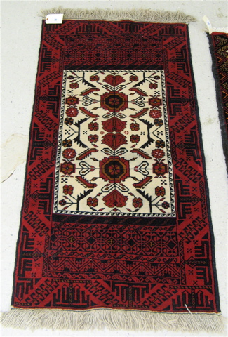 Appraisal: TWO PERSIAN BELOUCHI TRIBAL AREA RUGS ' X ' and