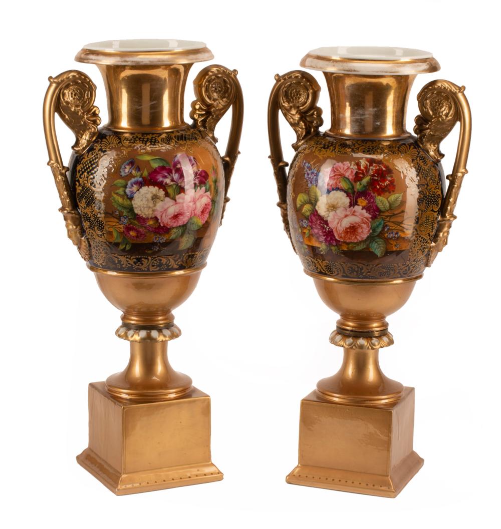 Appraisal: Pair of English Polychrome Porcelain Urns th c floral reserves