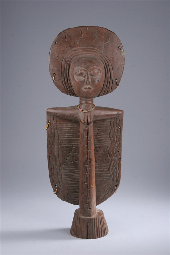 Appraisal: AFRICAN CARVED WOOD FIGURE OF A FEMALE Disc shaped headdress