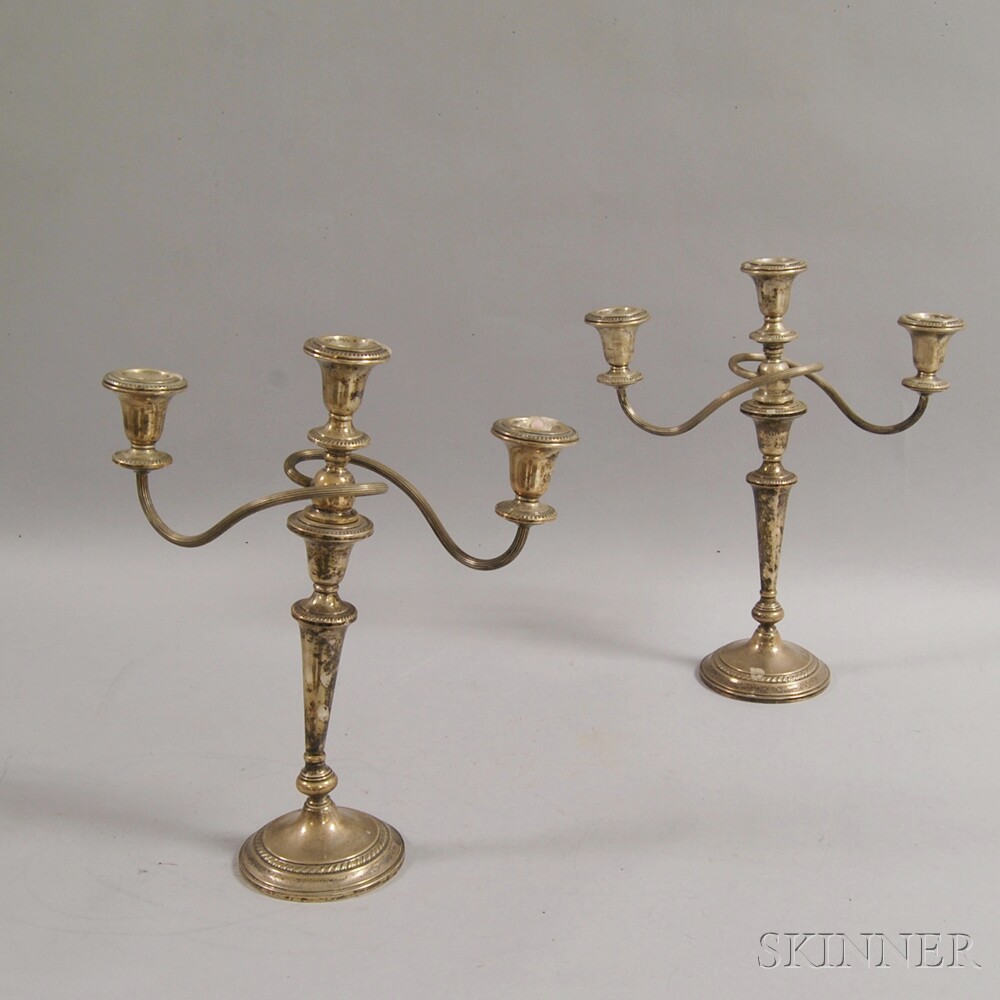 Appraisal: Pair of Hamilton Weighted Sterling Silver Convertible Three-light Candelabra base