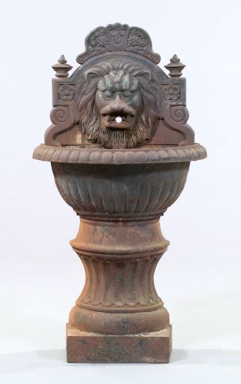 Appraisal: Neoclassical-Style Cast-Iron Wall Fountain the arched back with floral crest