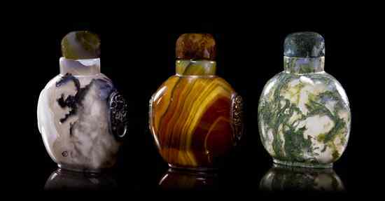 Appraisal: A Group of Three Agate Snuff Bottles each of compressed