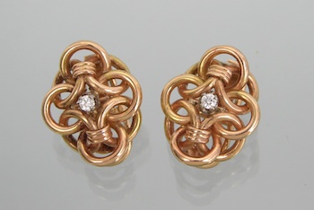 Appraisal: A Pair of Retro Design Gold and Diamond Ear Clips