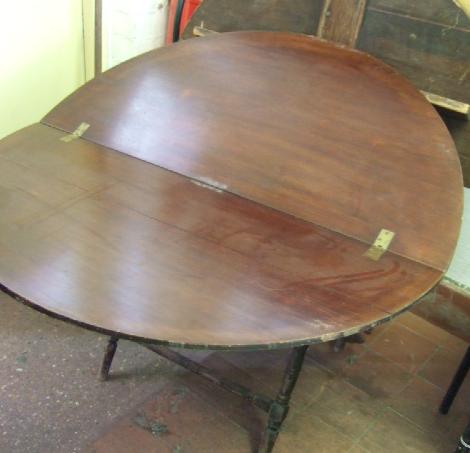 Appraisal: A pair of Edwardian beech framed coaching tables the folding