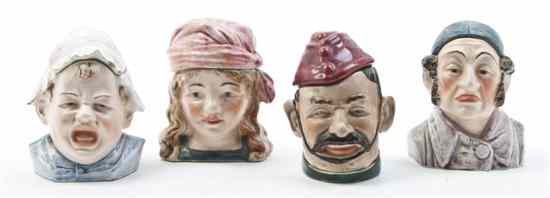 Appraisal: Four Ceramic Figural Tobacco Jars each depicting a figure in