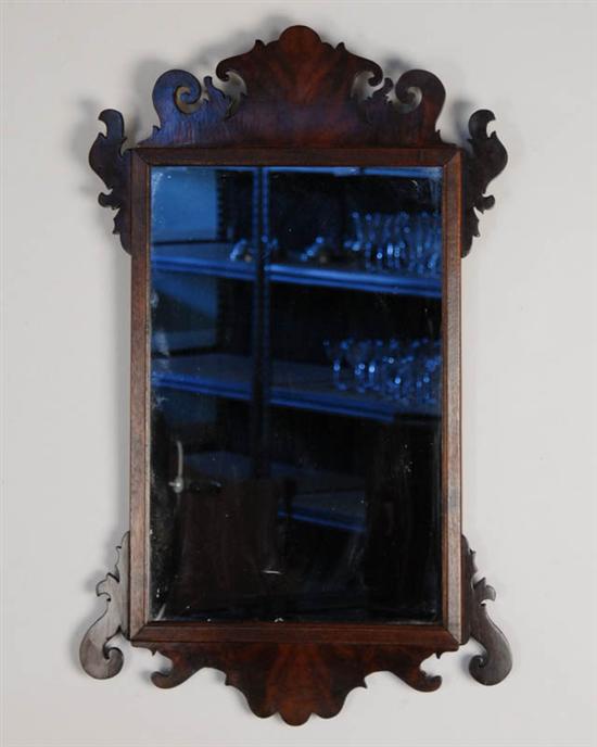 Appraisal: A Chippendale-style Looking Glass mahogany and mahogany veneer with pine