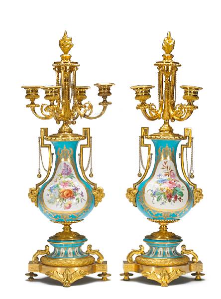 Appraisal: A pair of S vres style jeweled porcelain gilt bronze