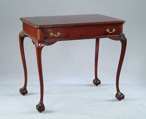 Appraisal: MAHOGANY BALL AND CLAW FOOT ONE DRAWER TABLE Bench made