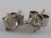 Appraisal: A pair of carat white gold diamond stud earrings diamonds