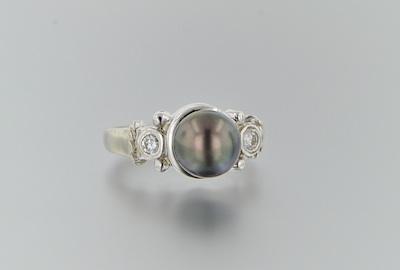 Appraisal: A Diamond and Black Pearl Ring k white gold ring