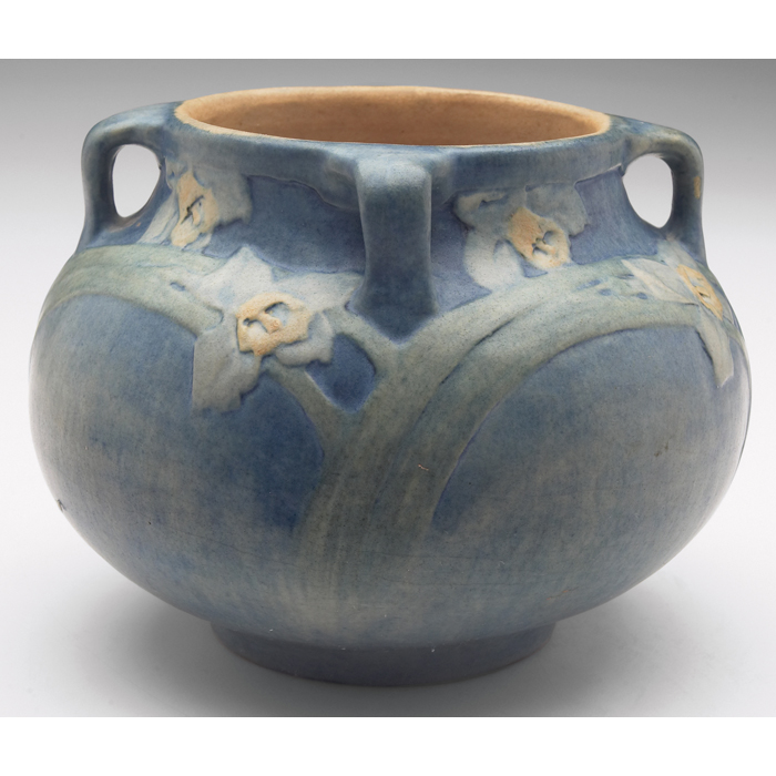 Appraisal: Newcomb College vase bulbousshape with four handles carved andpainted daffodils