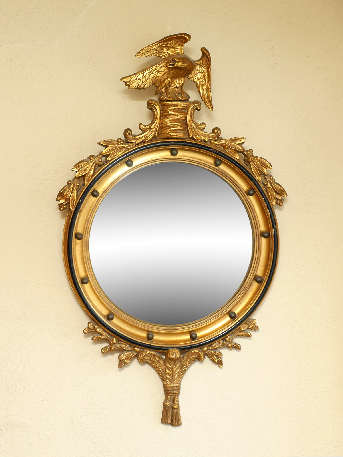 Appraisal: GILT WOOD FEDERAL STYLE BULLSEYE EAGLE MIRROR Gilt Bullseye mirror