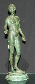 Appraisal: A bronze figure of a youth after the antique cms