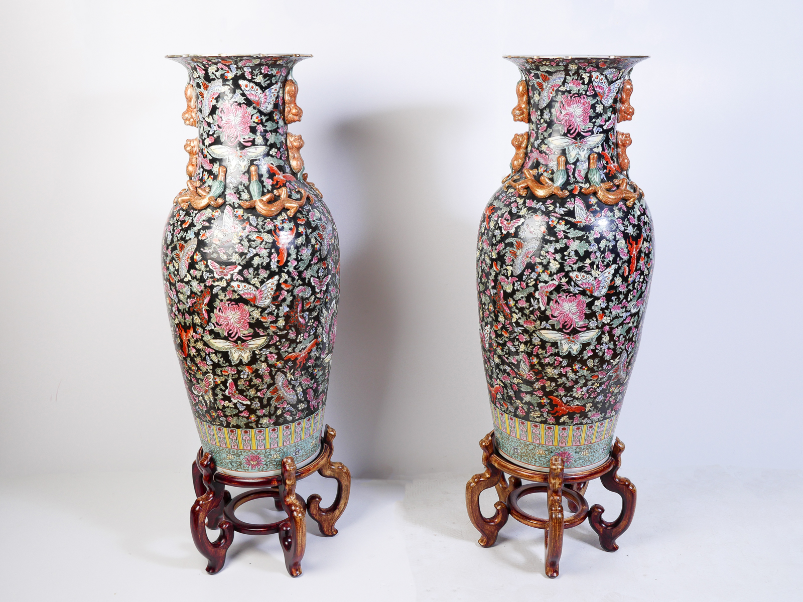 Appraisal: PAIR OF PALATIAL CHINESE FAMILLE NOIR VASES ON STANDS Pair