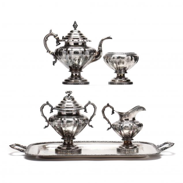 Appraisal: AN ASSEMBLED AMERICAN COIN SILVER TEA SERVICE A four piece